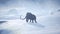 A huge mammoth is walking along a snow-covered glacier. Huge high glaciers in winter natural conditions. Arctic winter