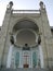 A huge massive arch of the Vorontsov Palace against the blue sky. Vronsovsky Palace, Crimea, Ukraine