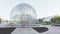 Huge modern glass plates globe sculpture on square