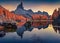 Huge mountain peak reflected in the calm waters of Federa lake.