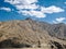 Huge mountains with white clouds in blue sky background on way frpm Manali to Leh