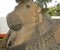 Huge Nandi bull stone statue outside temple