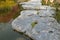 Huge natural step stone path way to walk on water pond garden at