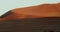 Huge orange sand dune in the Namib desert, stunning colorful footage, 4k