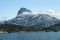 A huge peak rises up above the Greenland icecap on the edge of the Arctic Ocean