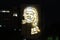 Huge picture of Che Guevara on the facade of a hotel at night in Havana, Cuba