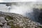 Huge and powerful Dettifoss waterfall, view from east bank, Iceland