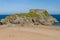 Huge, quiet sandy beach in summer Tenby`s Castle Beach, Wales