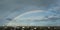 Huge rainbow in the sky with clouds