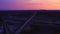 Huge road junction full of cars and trucks in countryside in winter, aerial view.