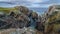 Huge rocks and boulder outcrops along Cape Bonavista coastline in Newfoundland, Canada.