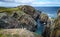 Huge rocks and boulder outcrops along Cape Bonavista coastline in Newfoundland, Canada.