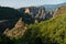 Huge rocks with christian orthodox monasteries at sunrise with Meteora valley in background near Kalambaka, Thessaly