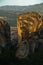 Huge rocks at sunrise with Meteora valley in background near Kalambaka, Thessaly