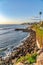 Huge rocks and waterfront properties bordering the ocean in San Diego California