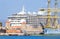 Huge sailing ship on the background of two cruise liners at port Rhodes, Greece