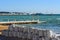 Huge sandbags on the beach of the French city of Cannes. Strengthening the coast.