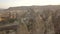 Huge sandy rocks with caves in them, aerial footage of Cappadocia, Turkey, 4k