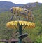 A huge sculpture of bee on flower