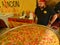 Huge Spanish specialty Paella cooking at international food fair