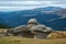 Huge sphinx-like stone in the Bucegi Natural Park in Romania. Megaliths on top of a mountain range, tourist attraction