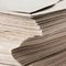 Huge Stack of Recycled Paper envelopes closeup. Business concep