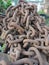 Huge stacks of chains, rusty, common in harbors.