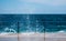 Huge stormy sea waves splash on cement pier