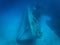 A huge sunken abandoned ship at a depth of 30 meters in crystal clear water. Grand Cayman.