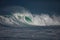 Huge surfing waves in ocean water during storm