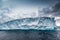 Huge table top iceberg floats in the Antarctic sea