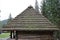 Huge thatched roof of traditional ukrainian house. Straw roof with dried grass