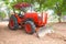 Huge tractor collecting haystack