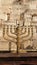 The huge traditional and state-owned menorah in the Western Wall plaza