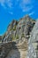 Huge vertical granite rocks and blue sky