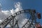 A huge Victorian Metal Ferris Wheel in a large public park in Vi