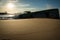 Huge wave water splash behind blockhouse on scenic beautiful sandy beach seascape with splashing waves