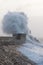 Huge waves crash over the seafront at Porthcawl, South Wales