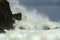 Huge waves crashing on the rocks