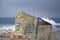 Huge waves splashes breakwater