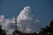 Huge White Billowing Cumulonimbus cloud in blue sky. Australia. Atmospheric sky art image