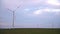 huge windmill generator turbines. Alternative energy.