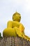 Huge yellow buddha statue