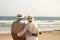 hugged senior couple on the beach. retirement travel