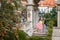 Hugging couple in baroque gazebo at terraced gardens below Prague Castle, Small FÃ¼rstenberg garden in district Lesser Town Mala