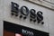 hugo boss brand text facade store signage and logo sign on shop wall facade