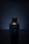 Hugo Boss men perfume bottle on dark blue background.