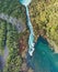 Huka Falls, New Zealand. Panoramic aerial view of beautiful waterfalls and countryside at sunset