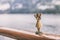 Hula dancer hawaii souvenir girl doll on cruise ship deck travel trip - funny vacation concept background. Autumn in Alaska