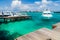 HULHULE ISLAND, MALDIVES - JULY 11, 2016: Boats at the harbor next to Ibrahim Nasir International Airport in Male